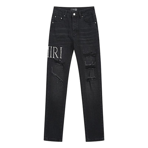 AMIRI Distressed Slim Tapered Jeans ¡ª hero