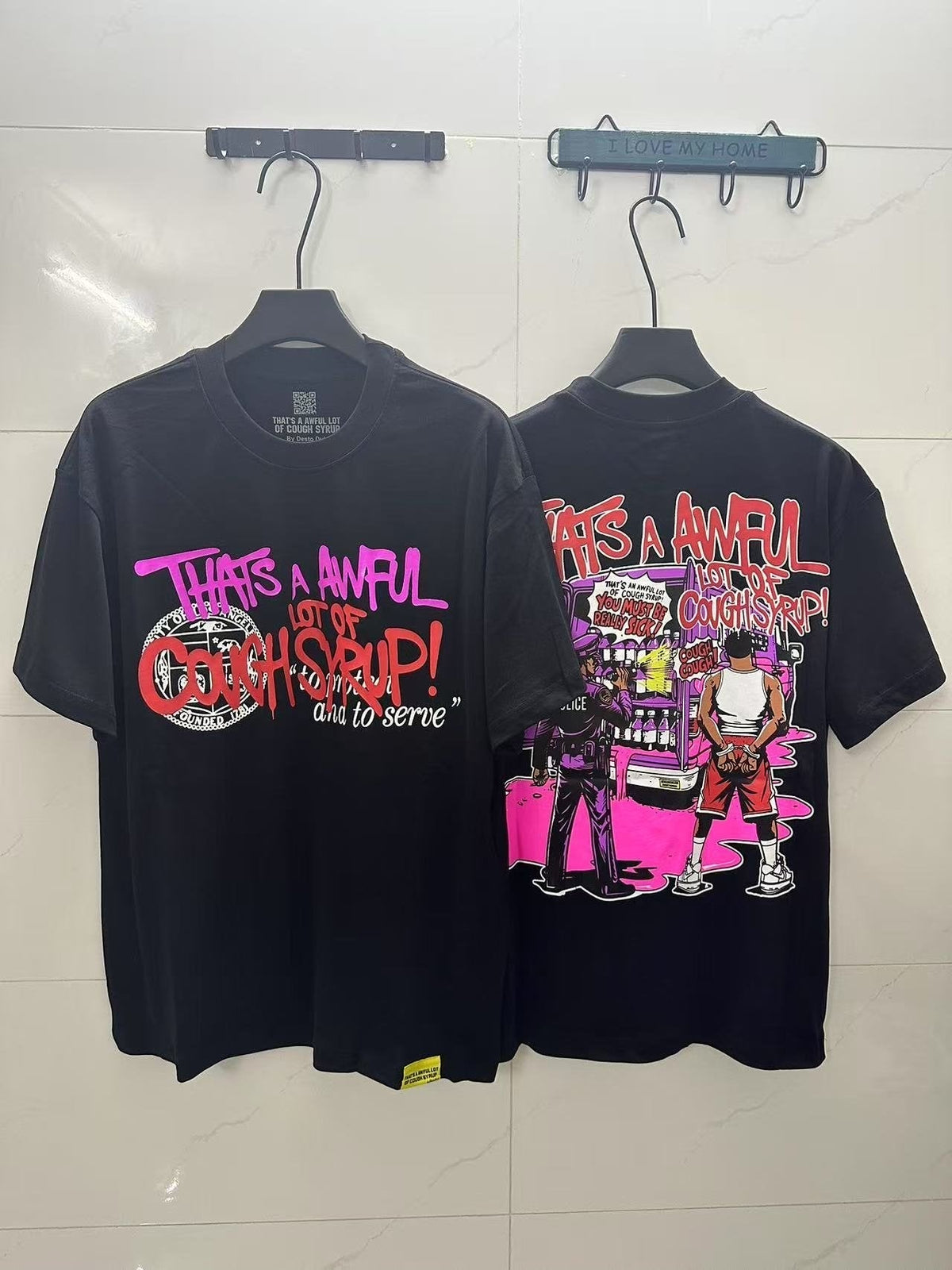 THAT'S A AWFUL LOT OF COUGH SYRUP Black Graphic T-Shirt ¡ª context