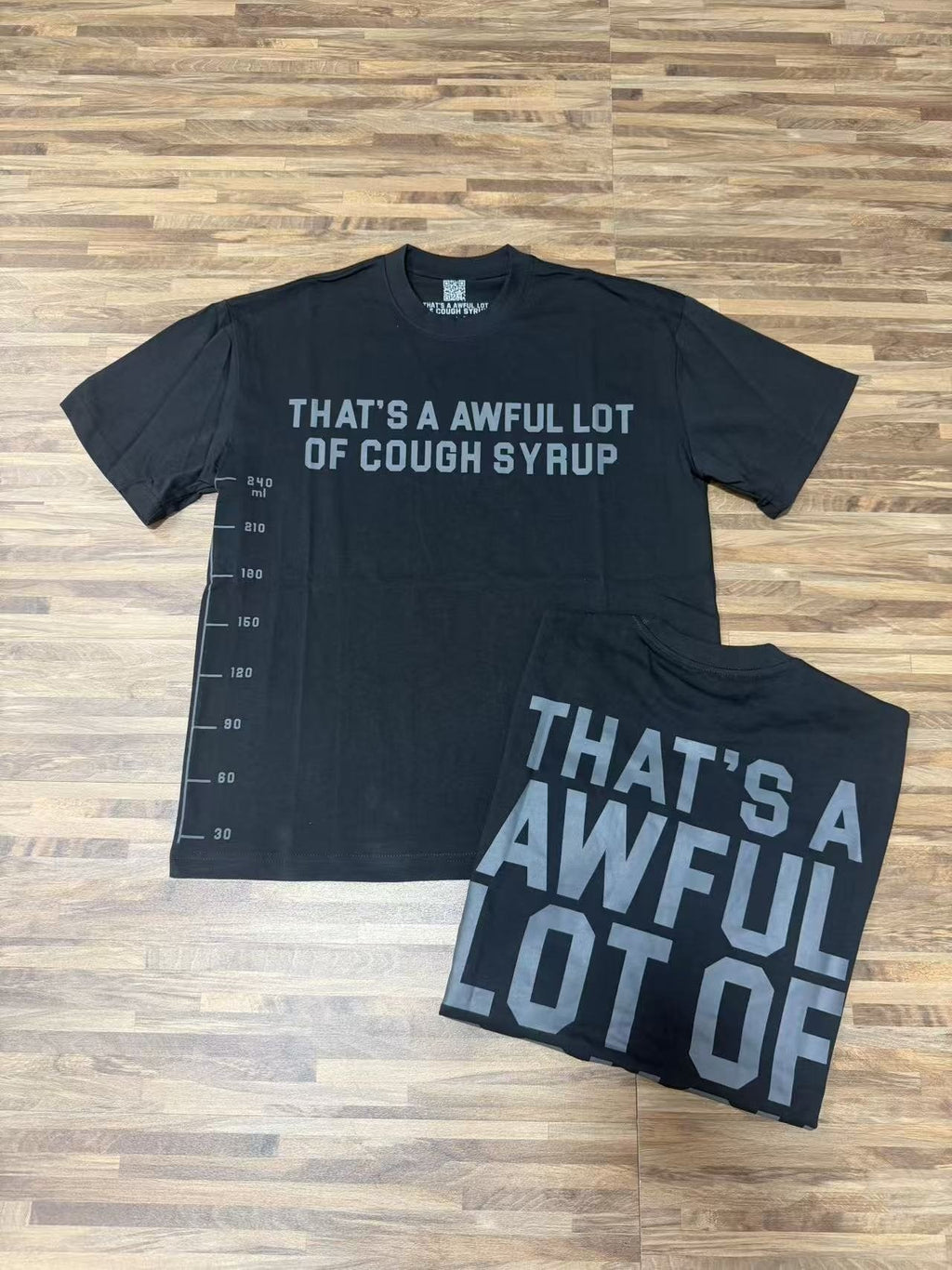 THAT'S A AWFUL LOT OF COUGH SYRUP White/Gray Wordmark T-Shirt ¡ª context