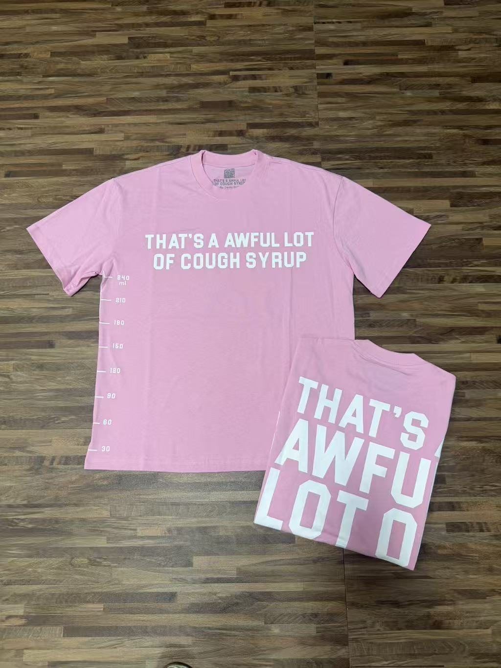 THAT'S A AWFUL LOT OF COUGH SYRUP White/Gray Wordmark T-Shirt ¡ª context