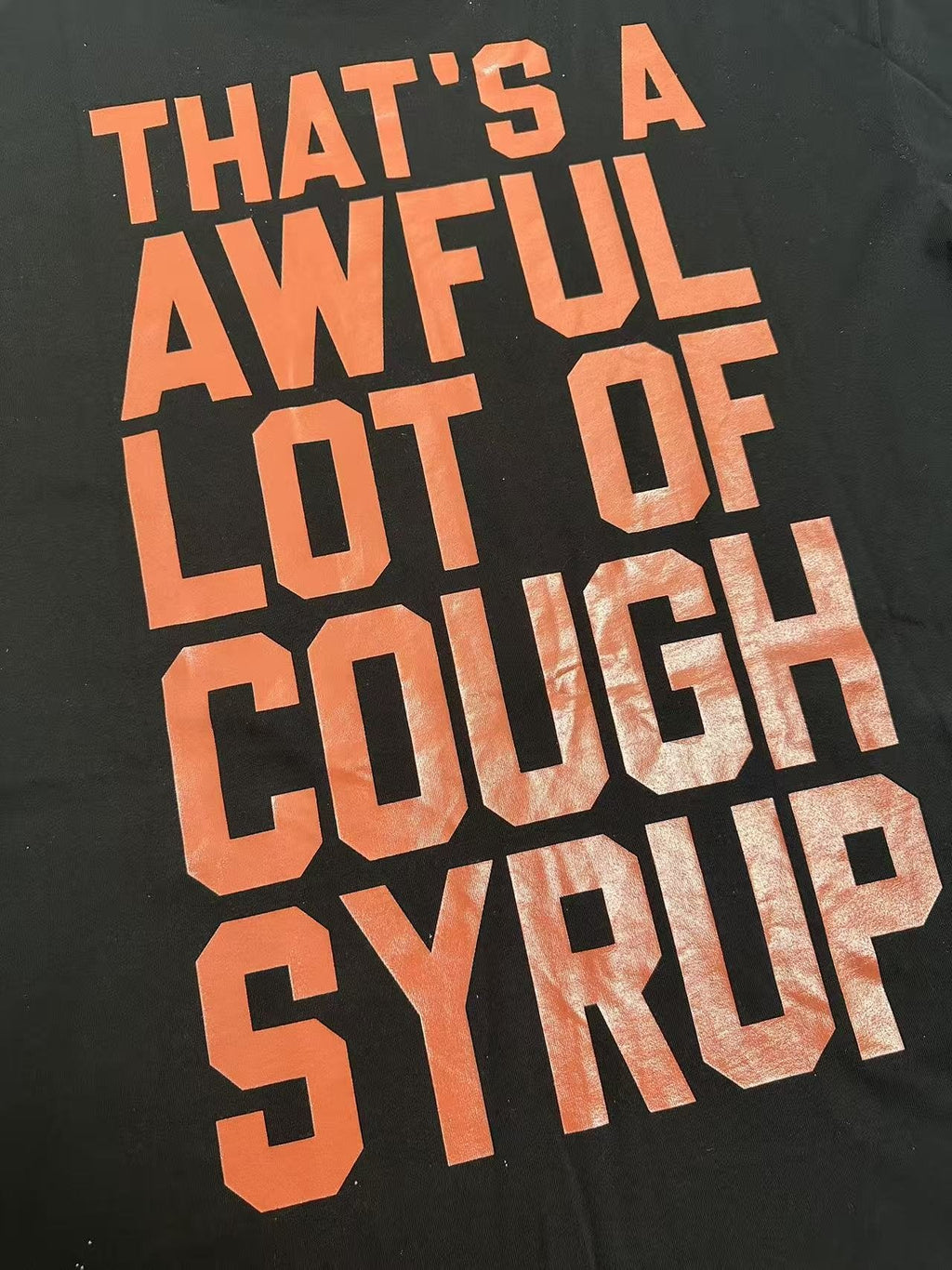 THAT'S A AWFUL LOT OF COUGH SYRUP Star Graphic Short-Sleeve T-Shirt ¡ª detail
