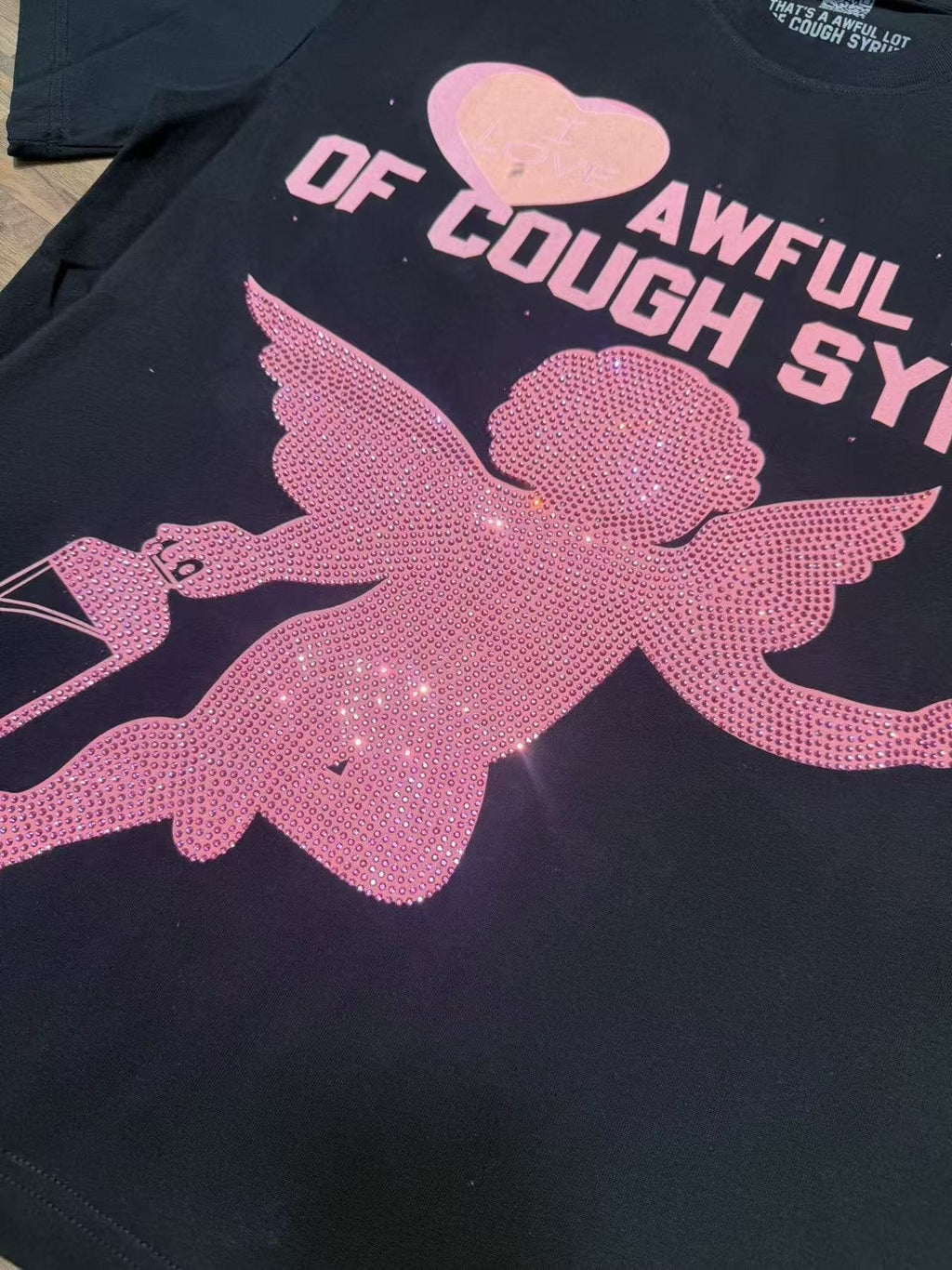 THAT'S A AWFUL LOT OF COUGH SYRUP Heart Cupid Graphic T-Shirt ¡ª fabric_closeup
