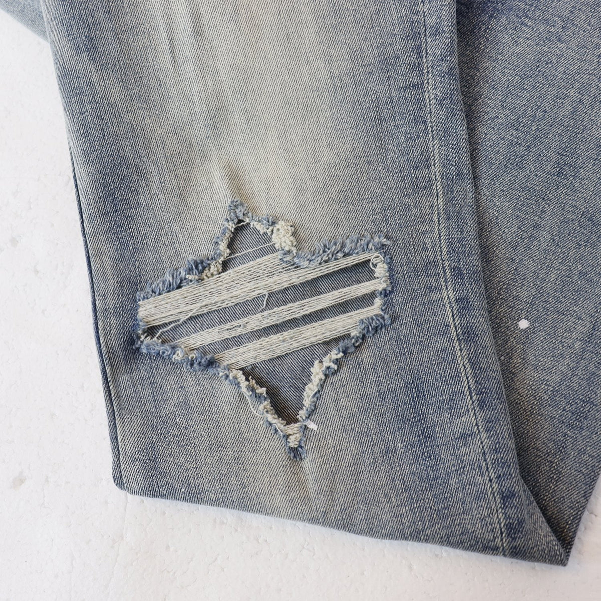 AMIRI Sinners Distressed Skinny Jeans ¡ª detail
