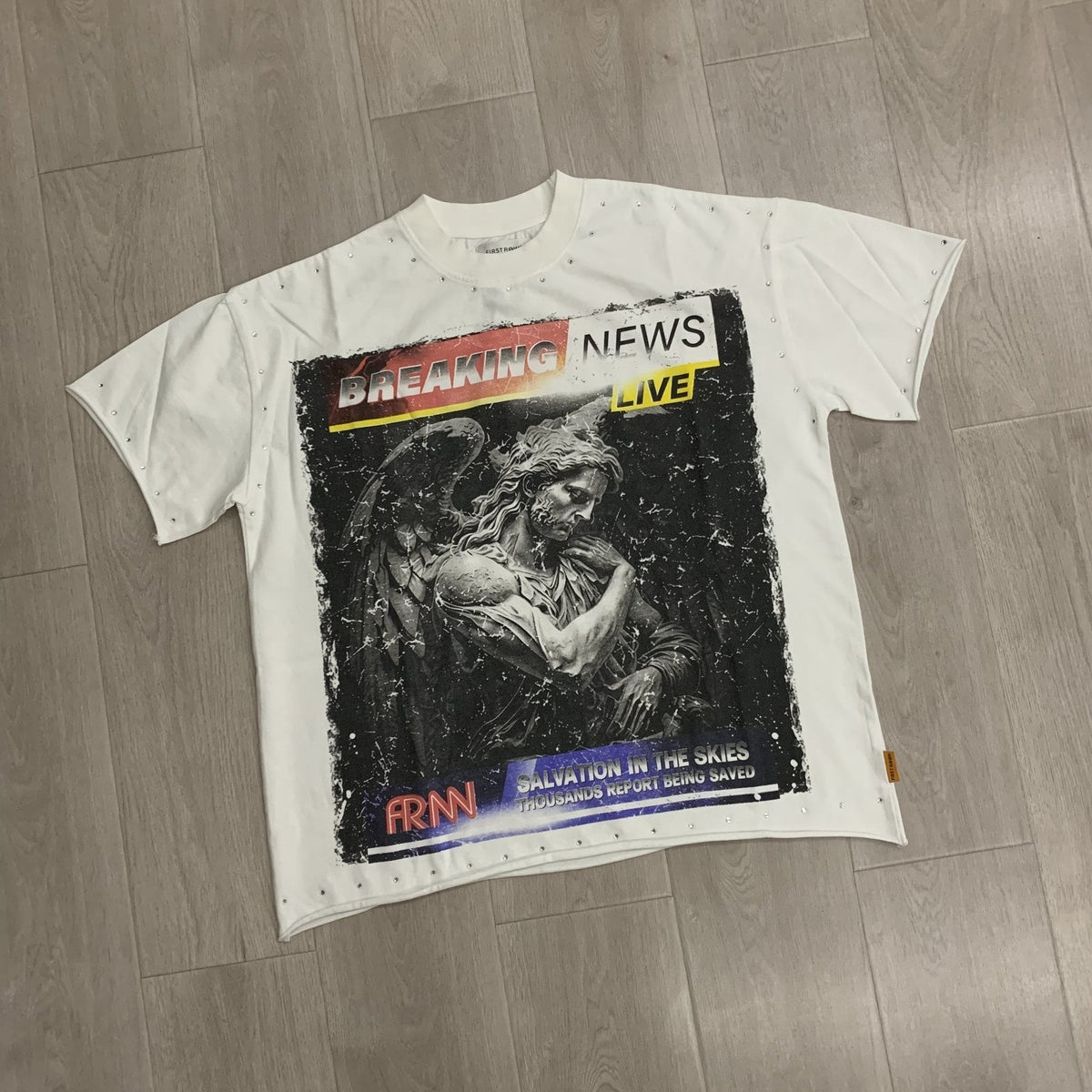 FIRST ROW Breaking News Salvation in the Skies Graphic T-Shirt ¡ª front