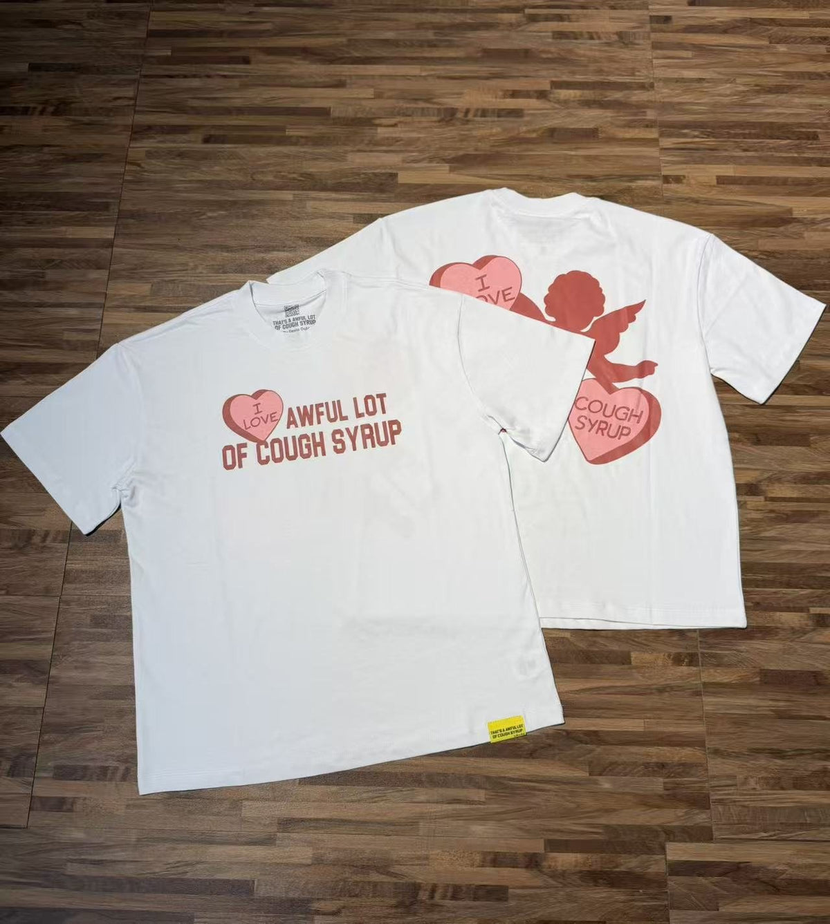 THAT'S A AWFUL LOT OF COUGH SYRUP Cupid Heart Graphic T-Shirt ¡ª context