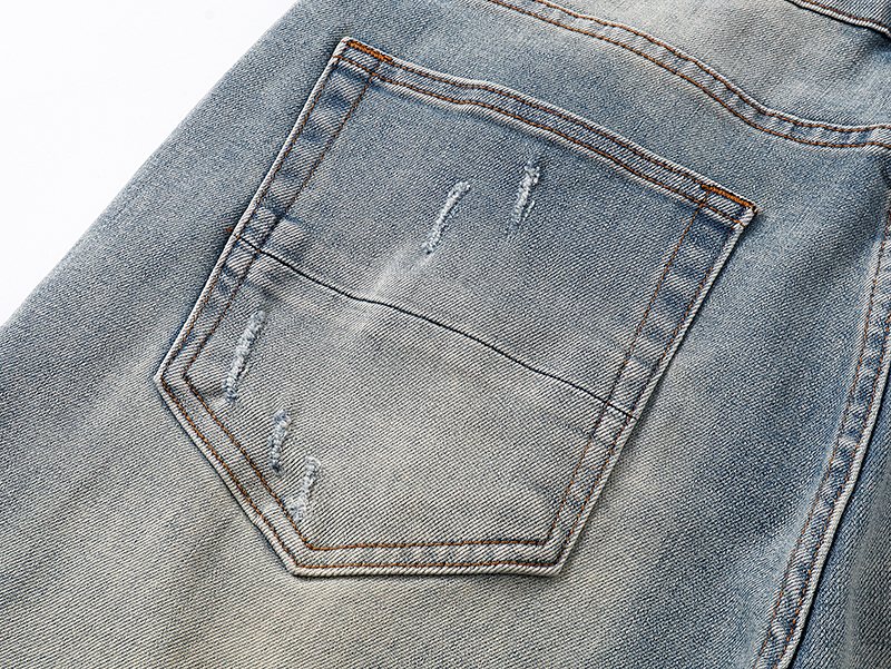 AMIRI Light Blue Distressed Monogram Denim Shorts ¡ª detail