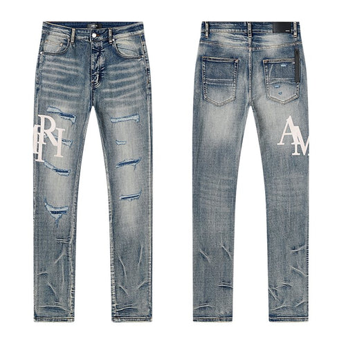AMIRI Light Blue Distressed Letter Graphic Jeans ¡ª hero