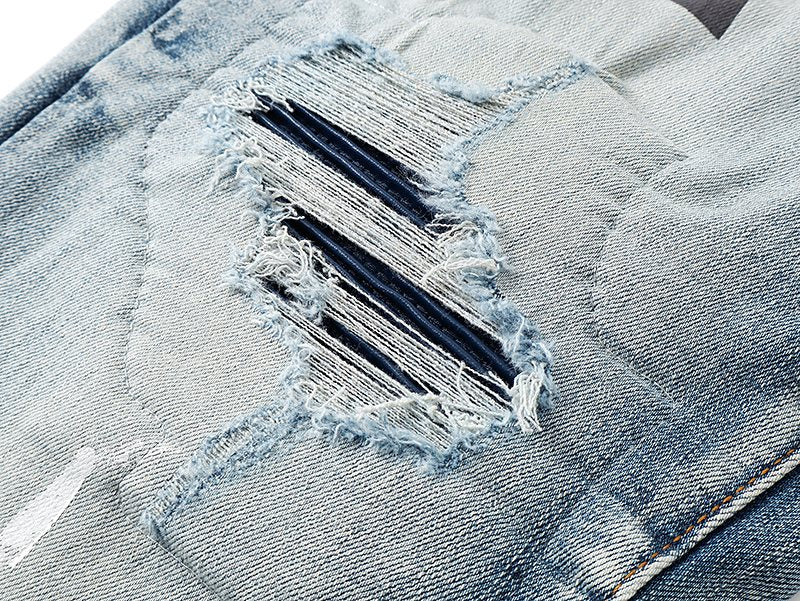 Amiri Light Blue Distressed Leg Print Jeans ¡ª detail