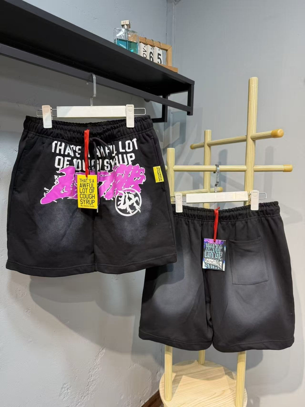 THAT'S A AWFUL LOT OF COUGH SYRUP Pink Car Text Graphic Shorts ¡ª front