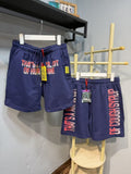 THAT'S A AWFUL LOT OF COUGH SYRUP Blue Text Graphic Shorts ¡ª front