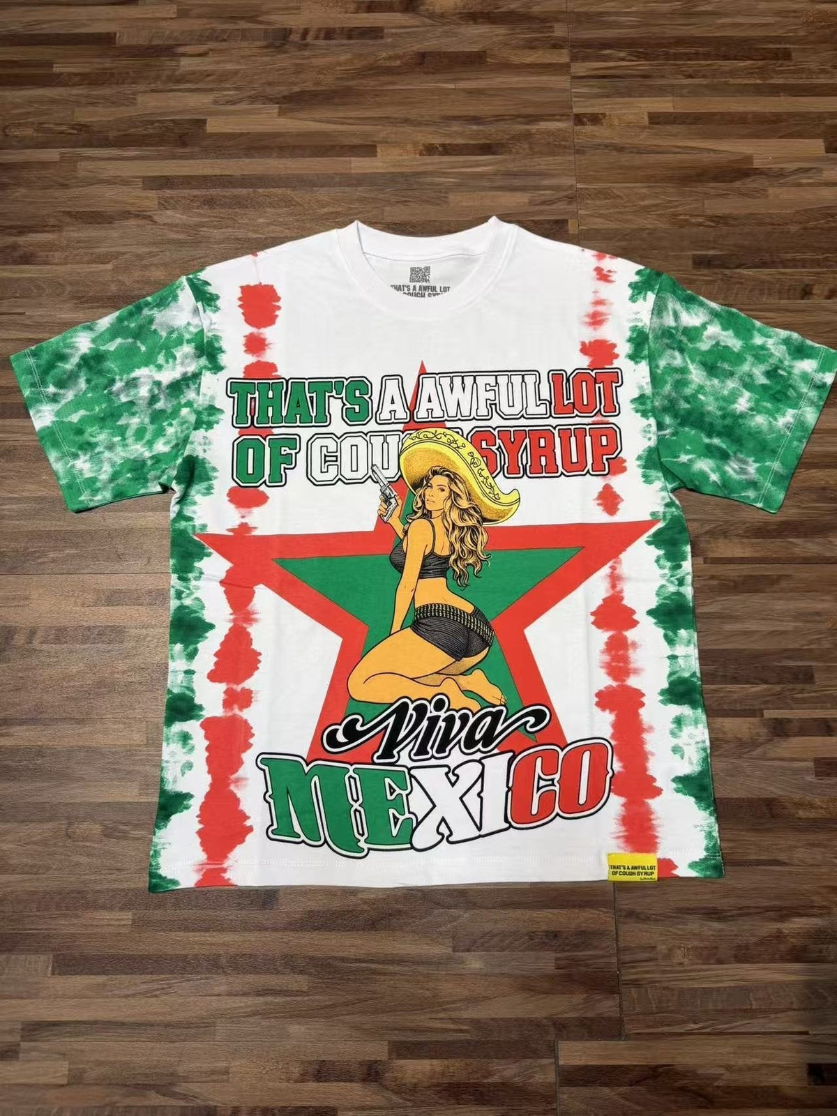 THAT'S A AWFUL LOT OF COUGH SYRUP White/Green Tie-Dye Graphic T-Shirt ¡ª front