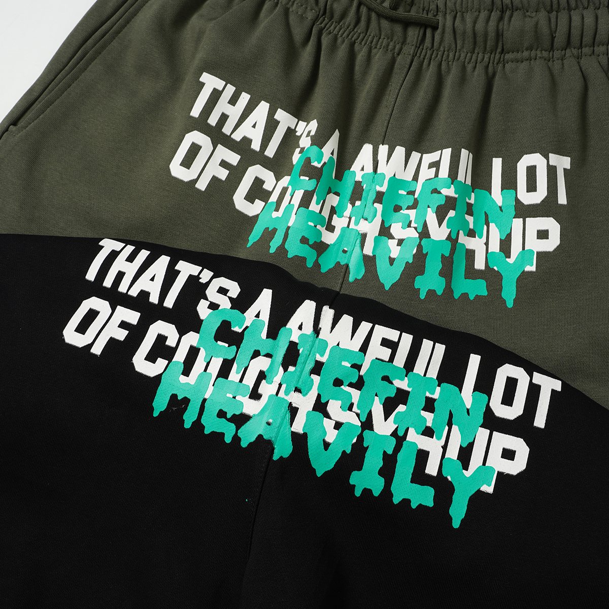 THAT'S A AWFUL LOT OF COUGH SYRUP Drawstring Graphic Shorts ¡ª detail