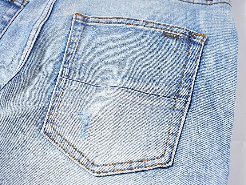 AMIRI Light Blue Distressed Paneled Jeans ¡ª detail