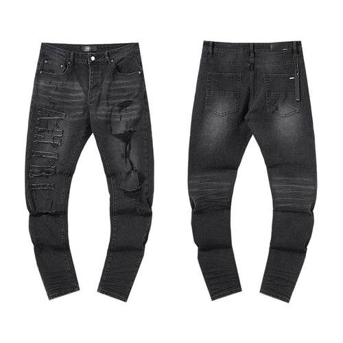 AMIRI Distressed Black Washed Jeans ¡ª hero