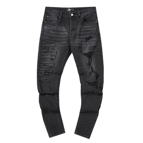 AMIRI Distressed Black Washed Jeans ¡ª front