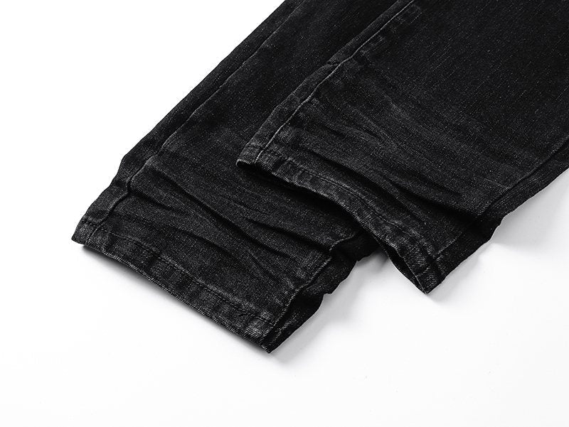 AMIRI Black Distressed Ribbed Knee Jeans ¡ª detail